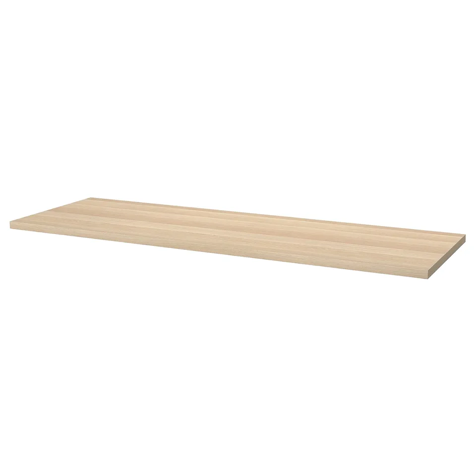 LAGKAPTEN: light wooden desk top, rectangular, smooth finish.