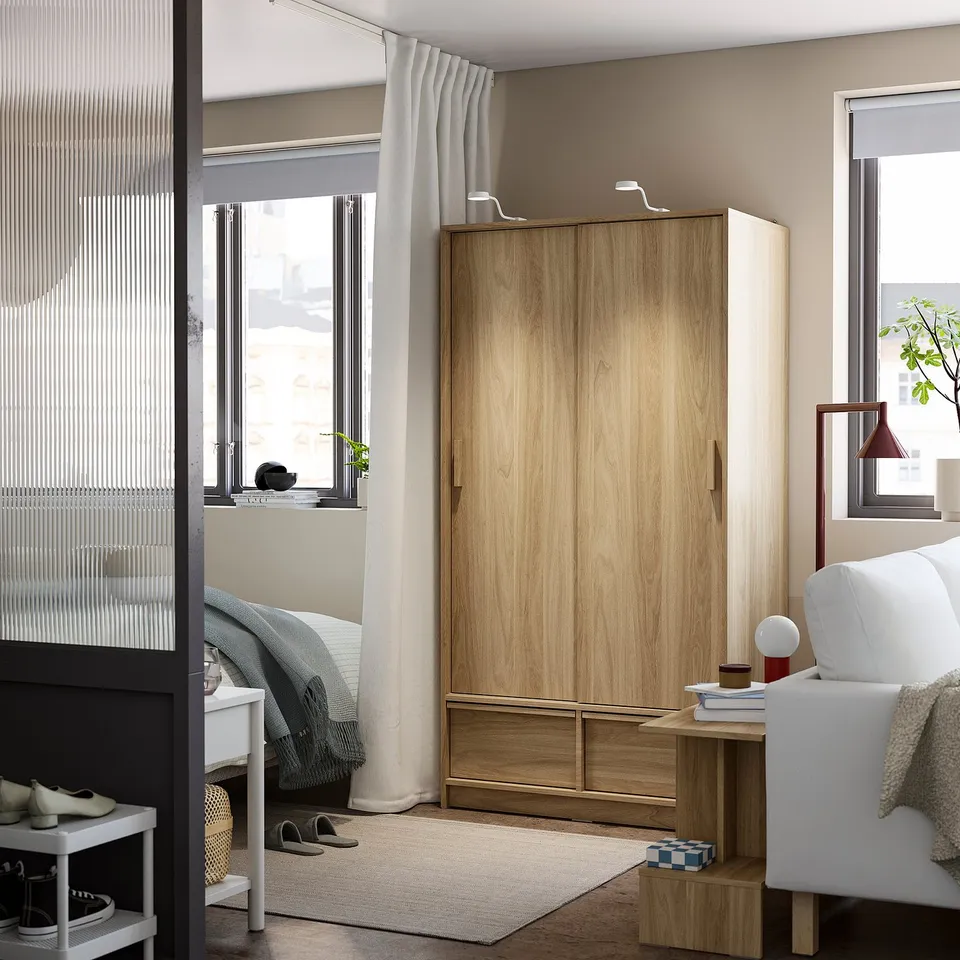 ANKARUDDEN Wardrobe with sliding doors, oak effect, 98x60x190 cm