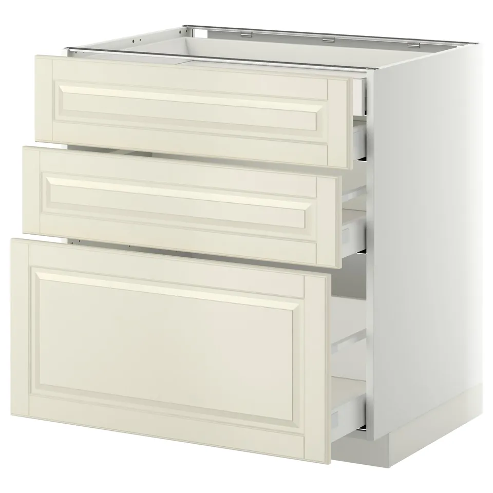 A white METOD kitchen unit with three drawers and a cabinet, featuring bevelled edges and a clean, traditional design.