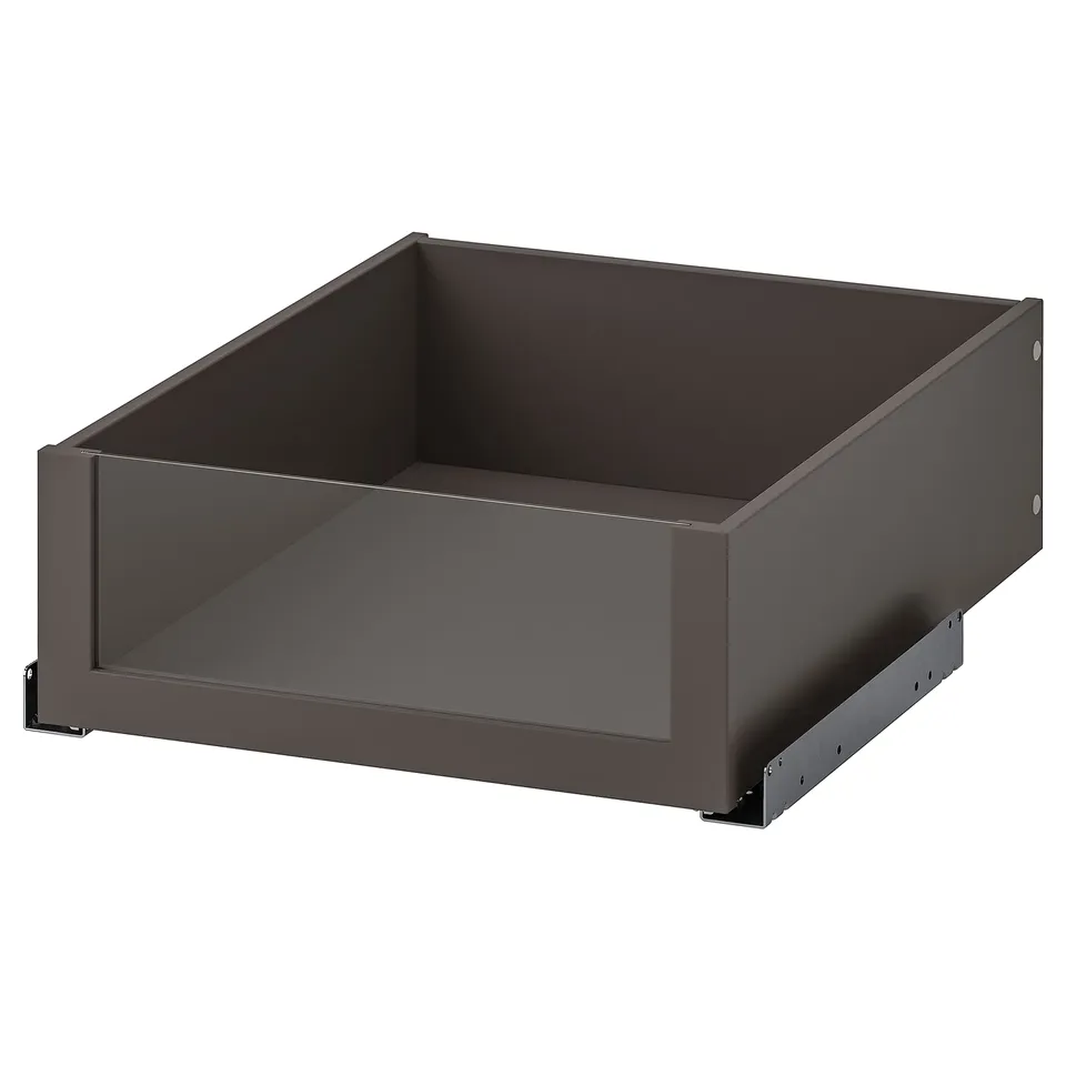 A grey KOMPLEMENT drawer with a glass front, designed for wardrobes, featuring a soft close mechanism.