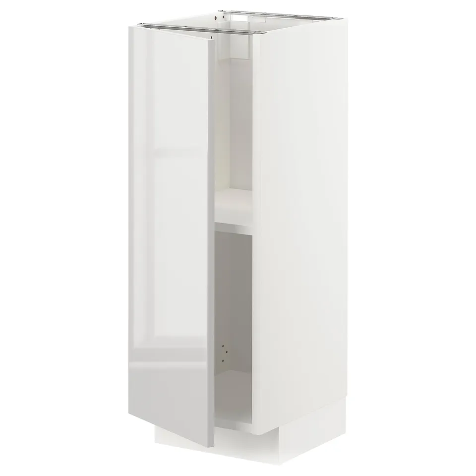 A white METOD kitchen cabinet with a glossy finish, rectangular shape, and two shelves.