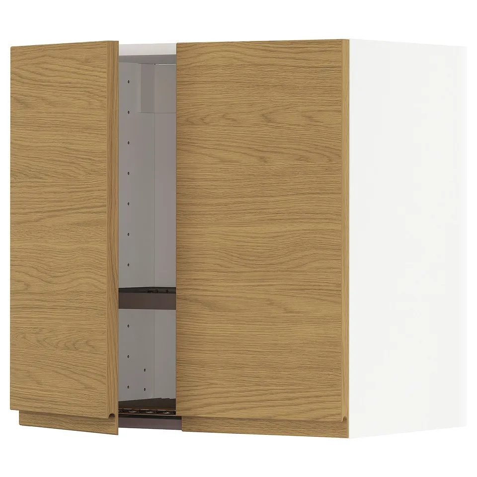 A METOD kitchen cabinet with oak-like wood finish and minimalist handles.