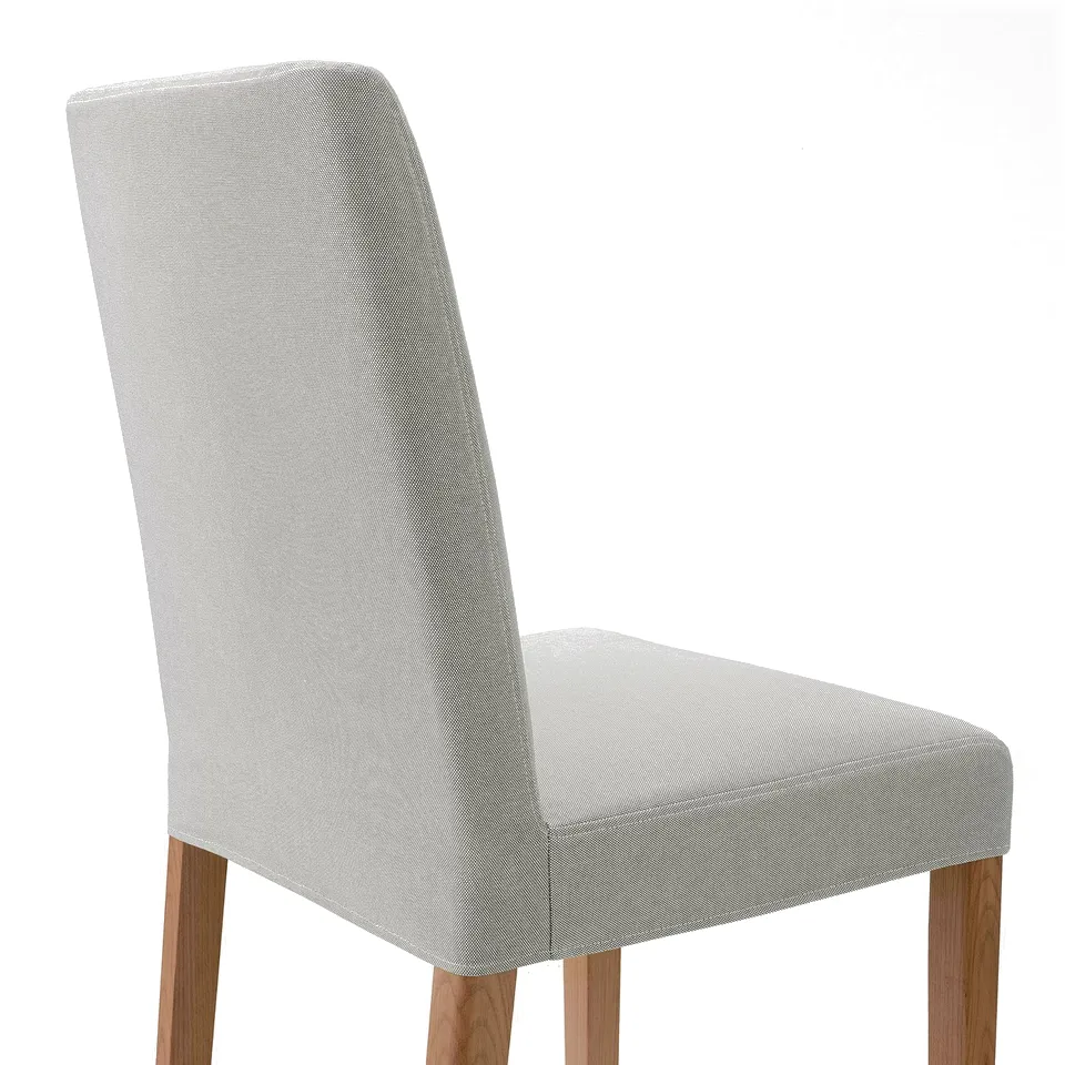 Modern dining chair with sleek light grey upholstery and wooden legs, designed for comfort and support.