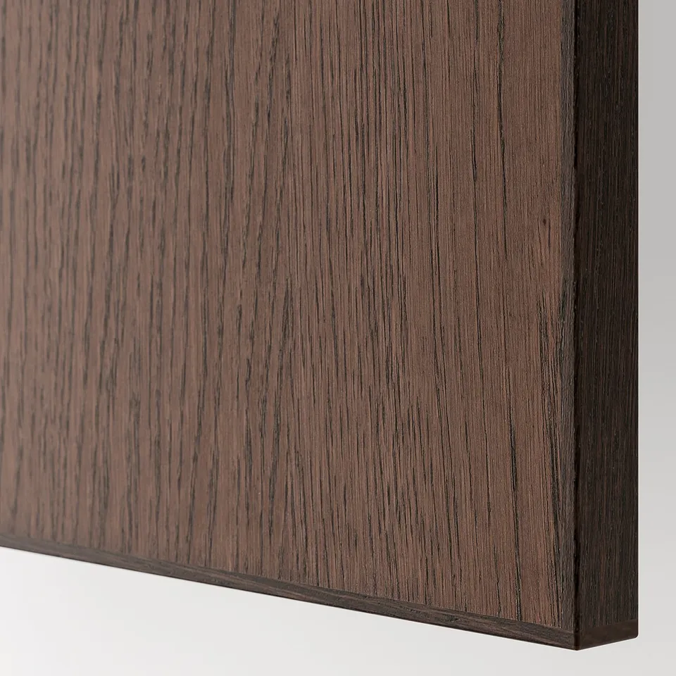 Dark brown wooden panel close-up, showcasing smooth texture and fine grain details, indicative of high-quality craftsmanship.