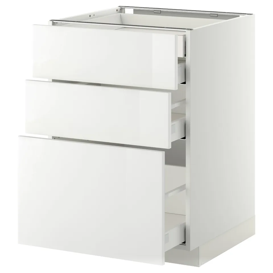 White METOD kitchen cabinet with three open drawers, modern design.