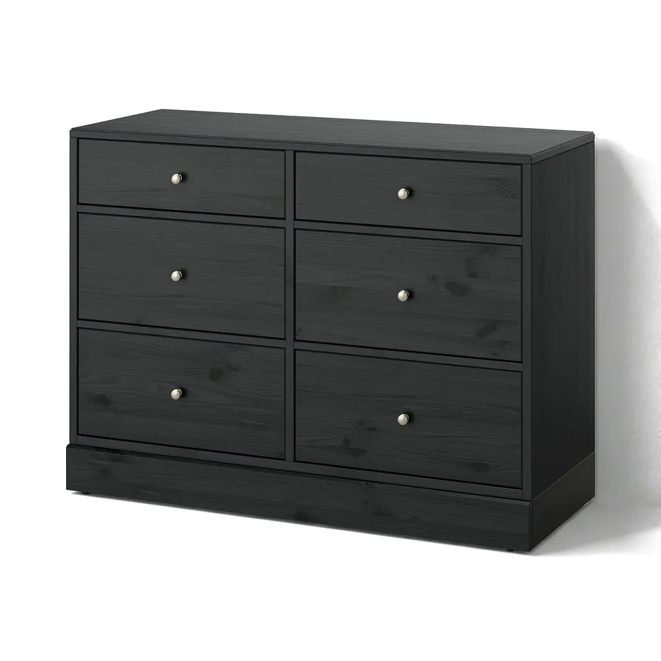 A dark grey HAVSTA dresser with six drawers, made from pine wood. It has a rectangular shape and simple design suitable for bedrooms.