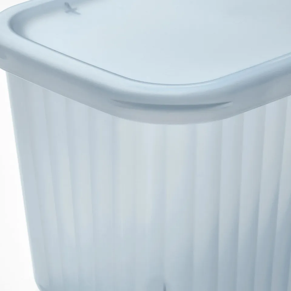 Clear, ribbed plastic box with lid, designed for organising small items, made from recycled material.