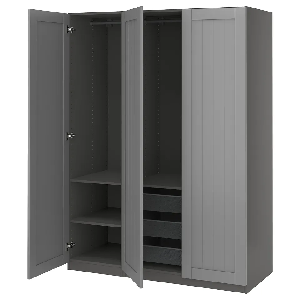 A grey PAX wardrobe with open doors, displaying shelves and a mesh drawer.