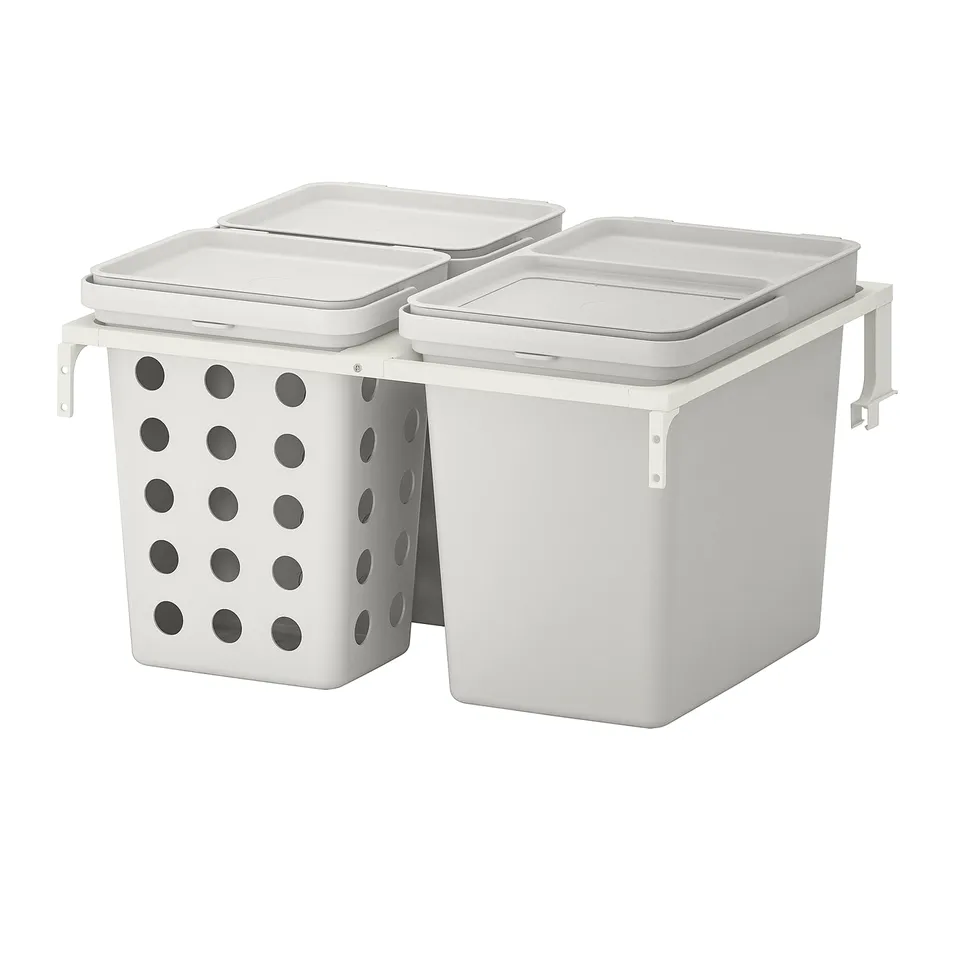 White HÅLLBAR waste sorting bins, lidded, mounted in frame, one perforated.