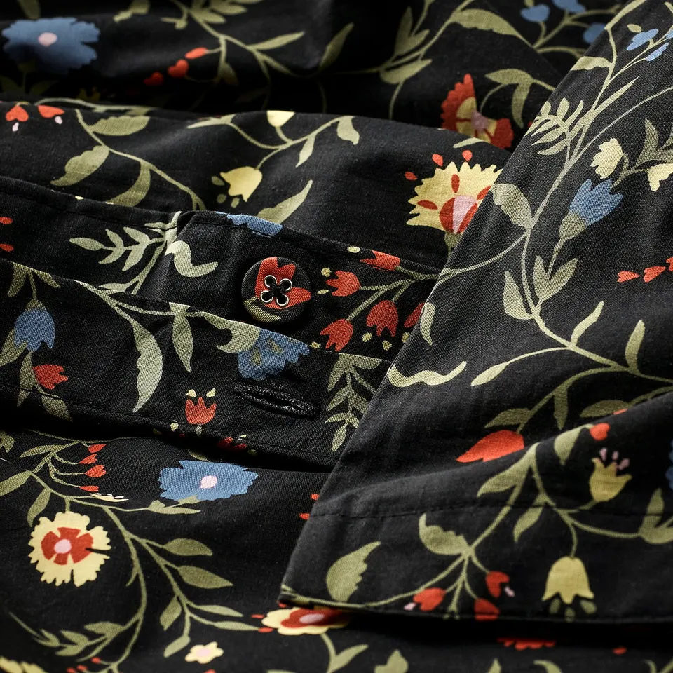 Floral black duvet set with vibrant wildflowers. Made of organic cotton, breathes, and absorbs moisture.