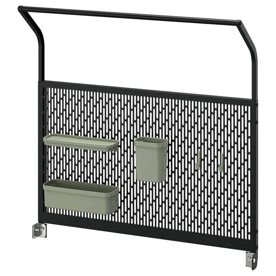 Black GRILLSKÄR outdoor kitchen back panel with green plastic containers. Metal, rectangular, grid design with storage.