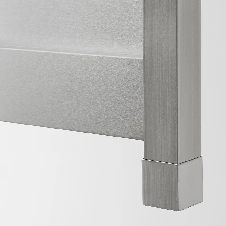 Sleek, stainless steel kitchen panel with clean, angular edges ensuring durability and modern aesthetic.