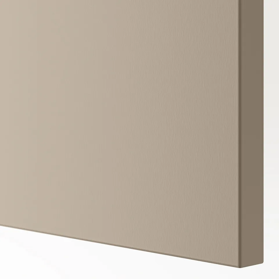 Beige cabinet door with smooth, semi-matte finish. Corner close-up showing refined edge and texture.