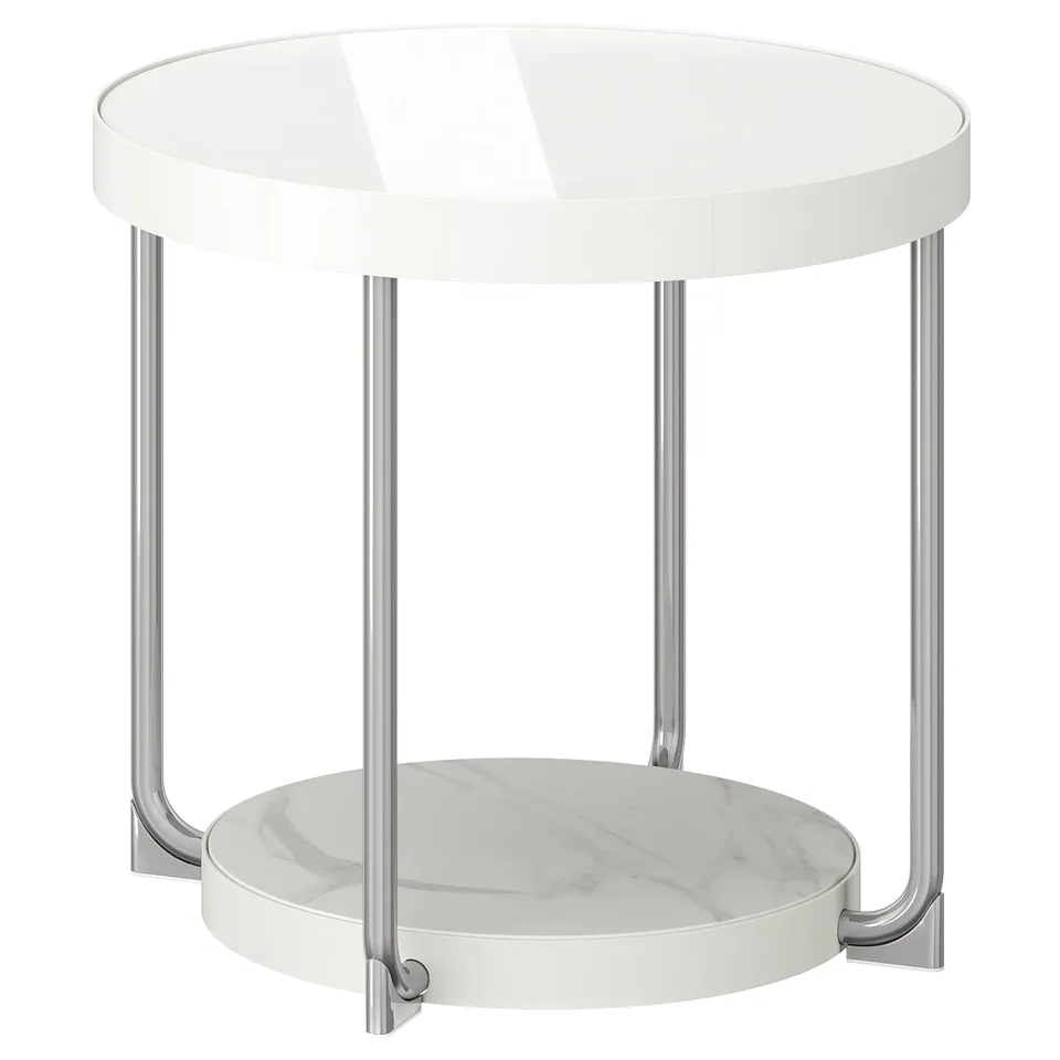 A round, white side table named FRÖTORP with a glass top, chrome legs, and a marble-effect shelf below, exuding a sleek, modern design.