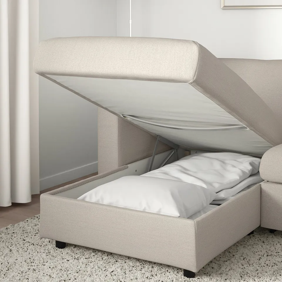 Modern sofa-bed with storage. Chaise seat lifts to reveal ample space. Easy bed conversion with thick mattress.
