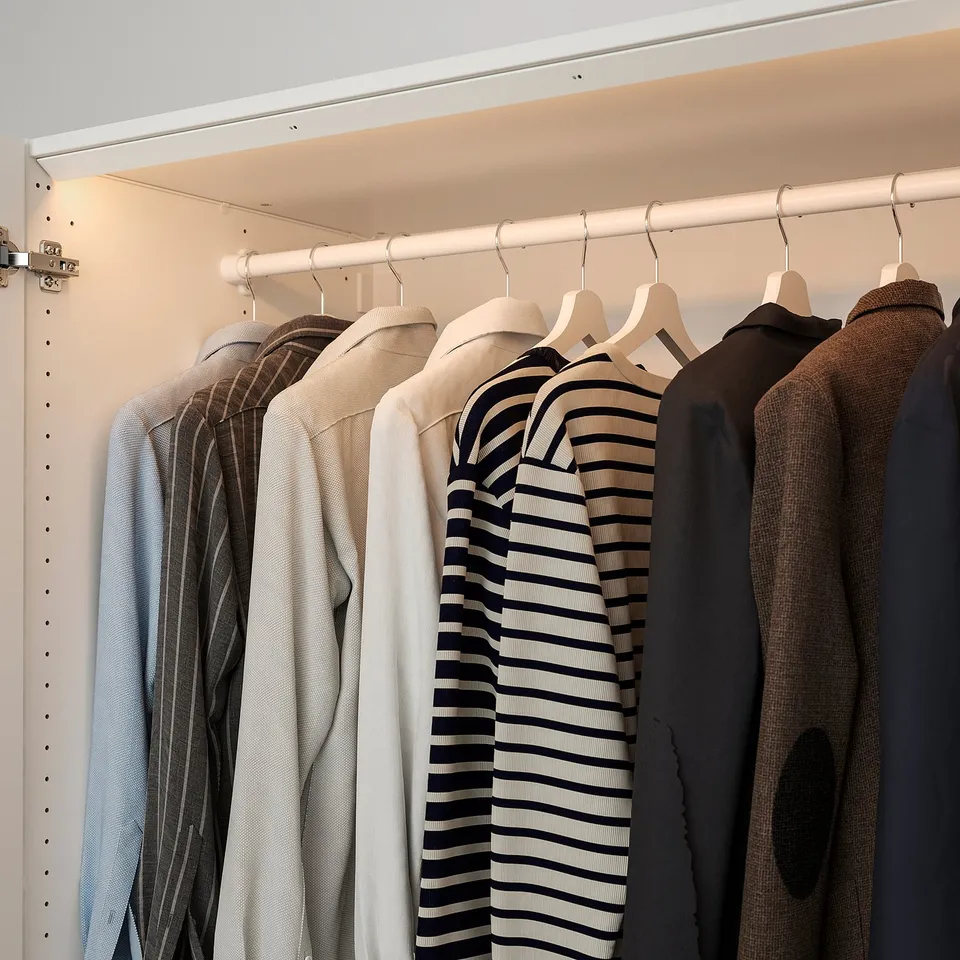 Modern closet with led light. Door-opening illumination for clear visibility.