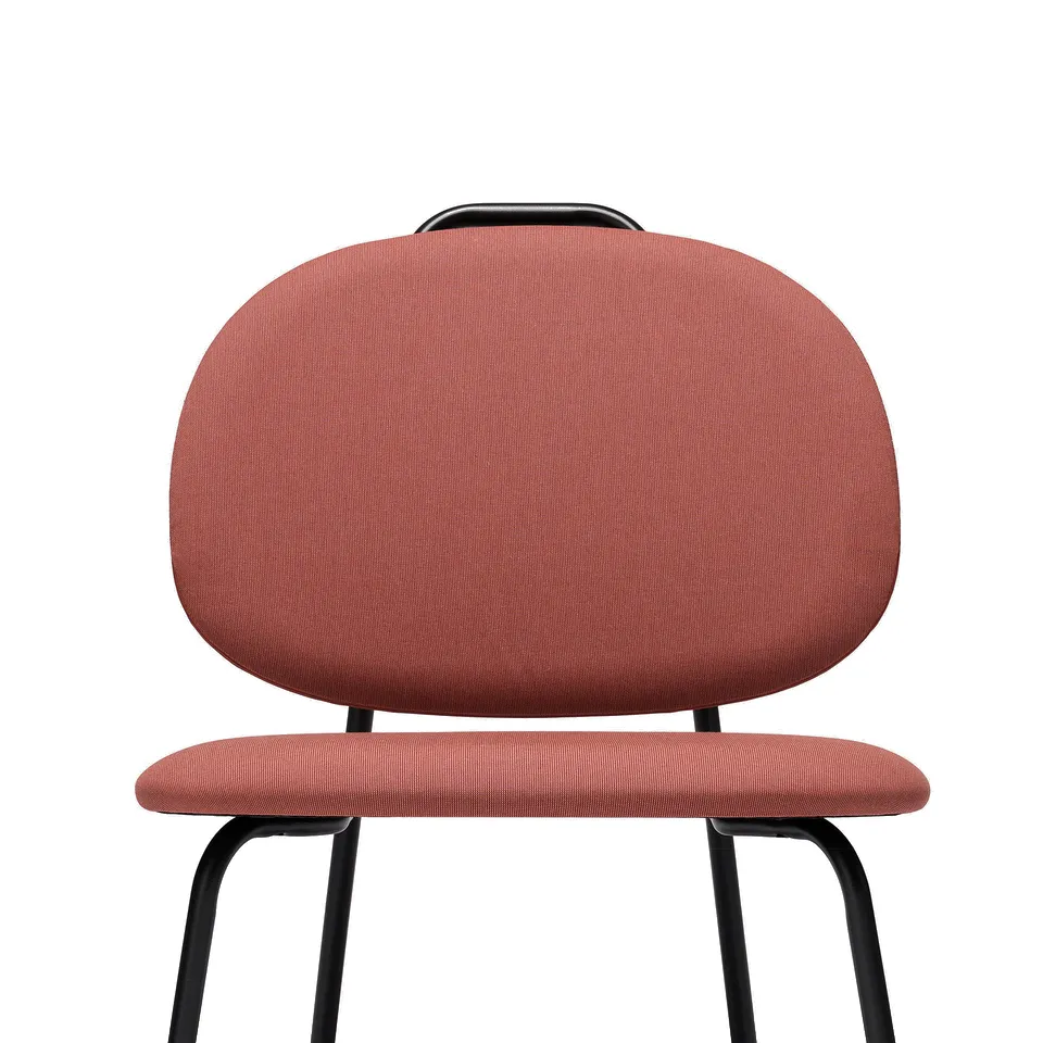 A modern red office chair, upholstered in durable polyester, featuring a sturdy metal frame and ergonomic design.