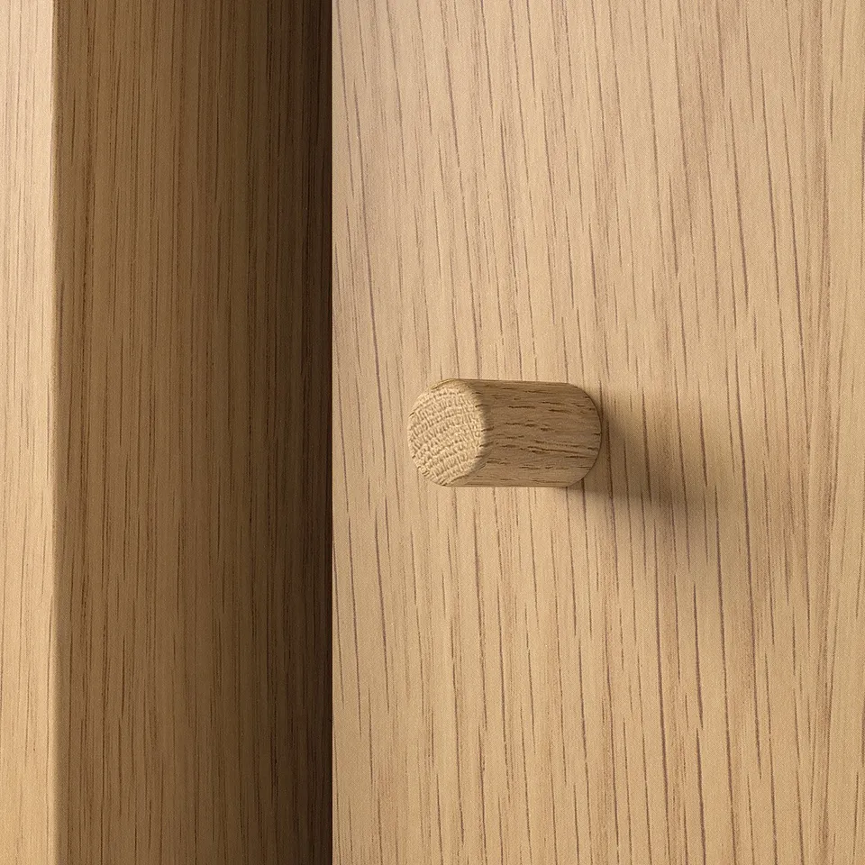 Wooden cabinet door with modern handle. High-quality finish, sleek design.