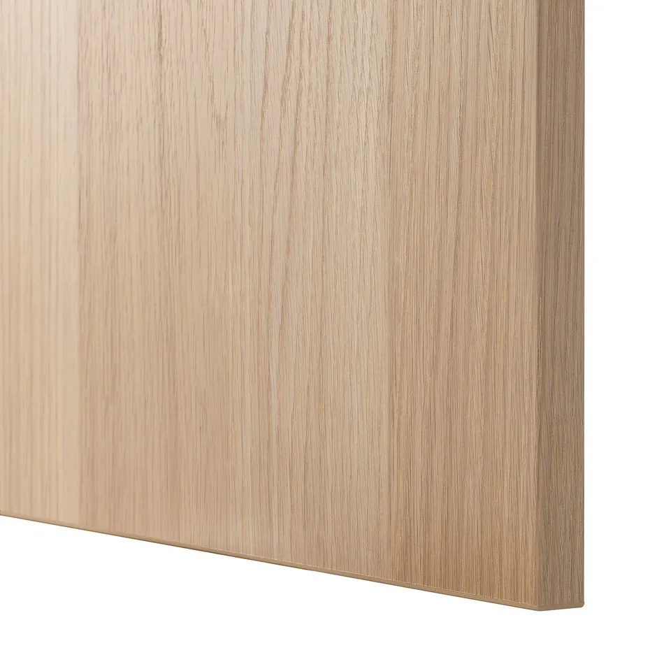 Close-up of light oak wooden surface, smooth texture, uniform grain pattern.