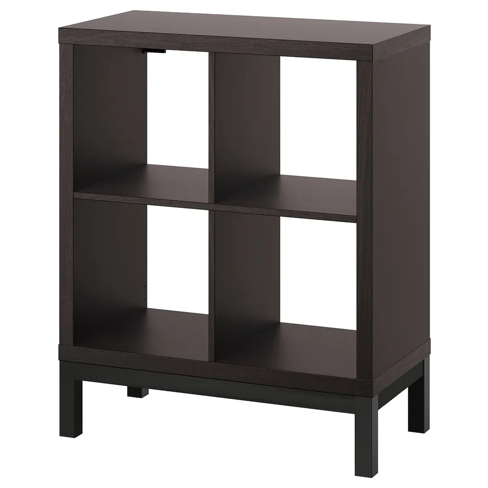 An empty KALLAX black shelving unit with square compartments and four legs.