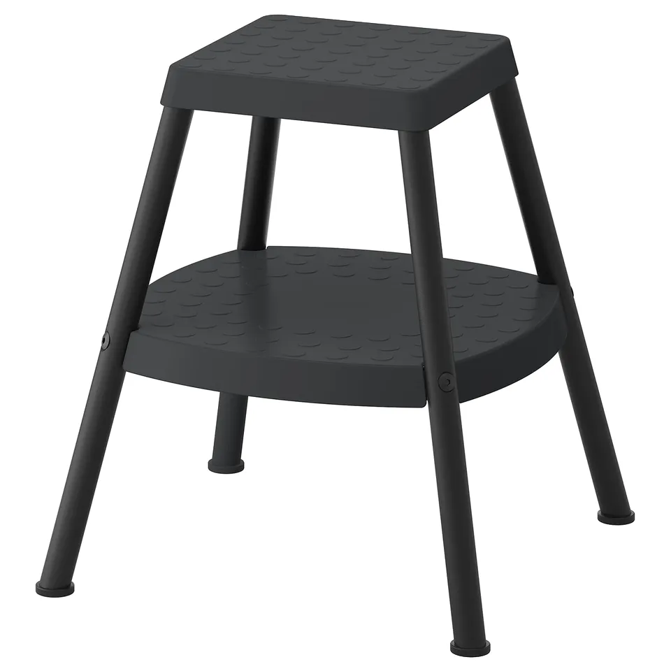 A black HADDARP step stool with two steps, designed for easy storage access.