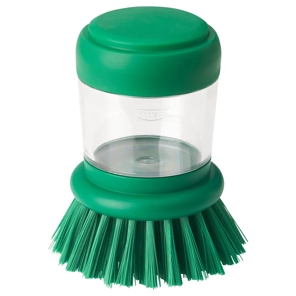 A green VIDEVECKMAL dish brush with a liquid dispenser. It has a transparent cylinder for soap and green bristles.