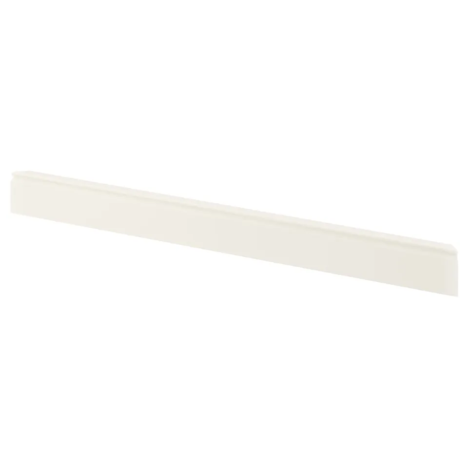 A white FÖRBÄTTRA plinth, a decorative kitchen skirting board made of fibreboard and plastic foil.