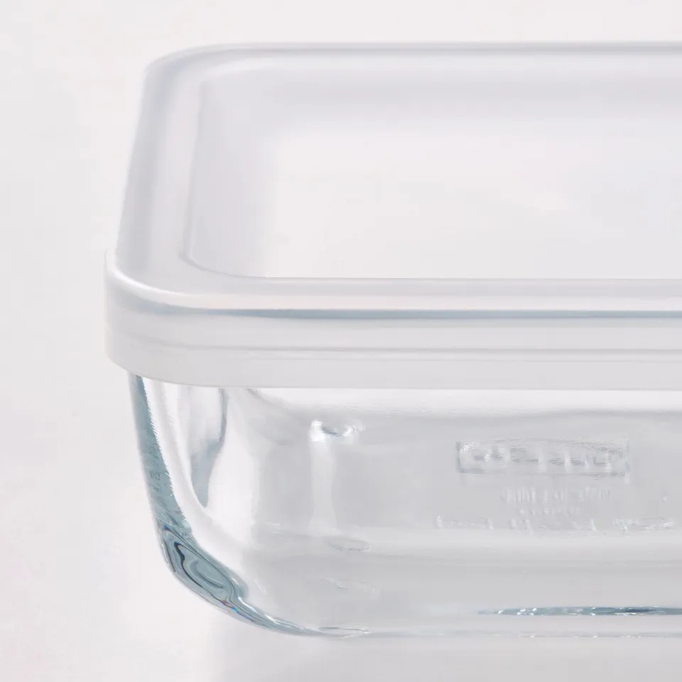 Glass food container with clear, snug lid, great for fridge storage.