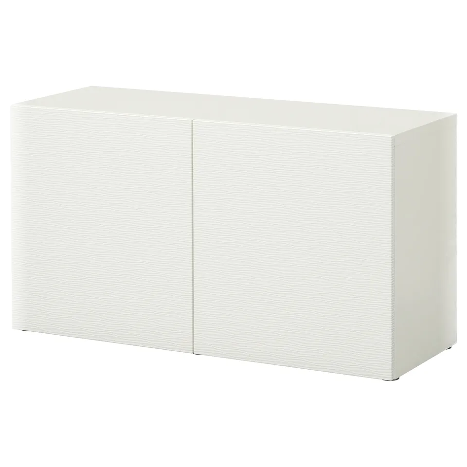 A white BESTÅ storage unit, featuring a rectangular shape with two doors and a sleek, modern design.