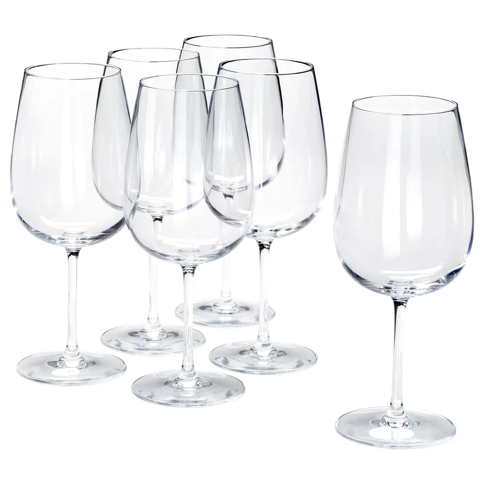 Six clear STORSINT crystal glasses, elegantly shaped with long stems and narrow opening, perfect for wine or spirits.