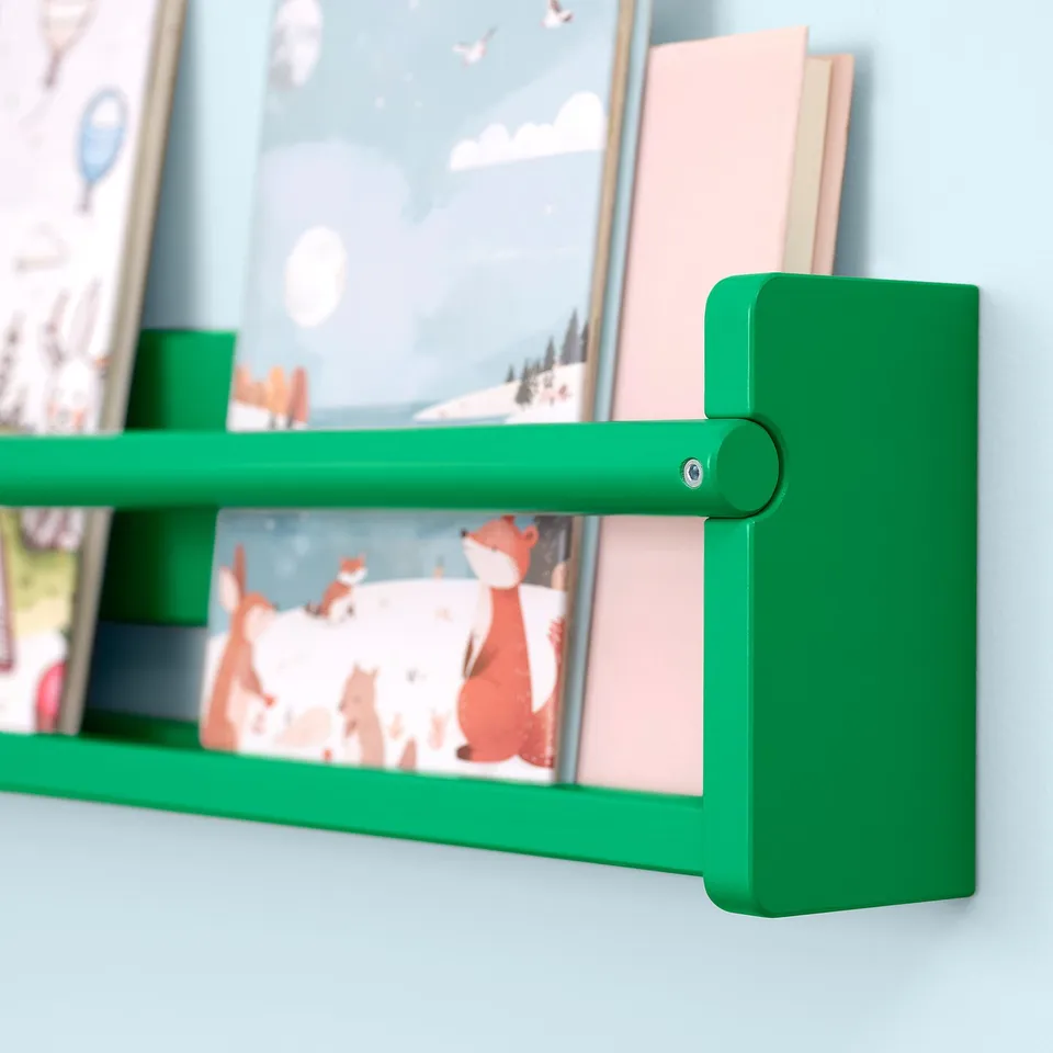 Bright green childrens wall shelf with books, showcasing durable design and vibrant colour.