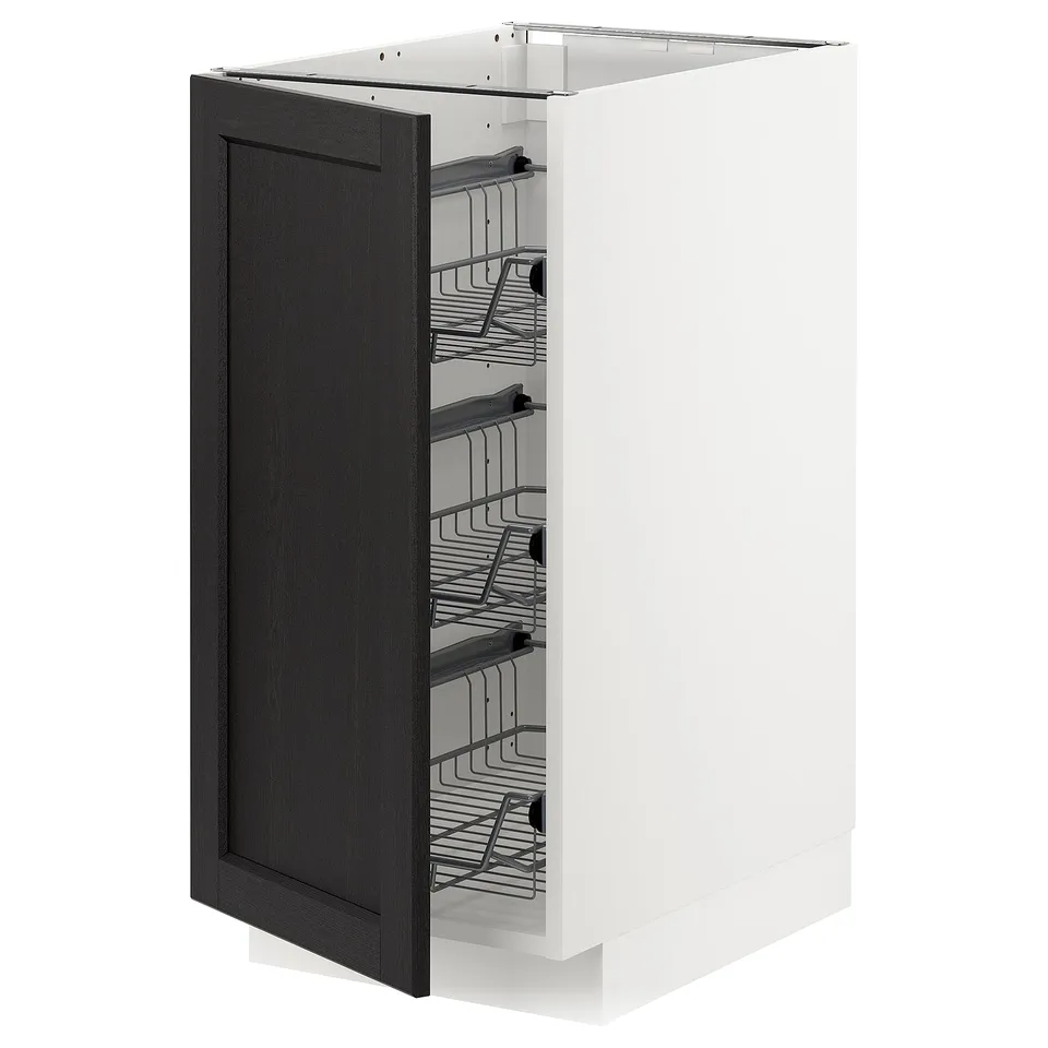 A METOD kitchen unit with a black stained wooden door, featuring wire organisers inside.