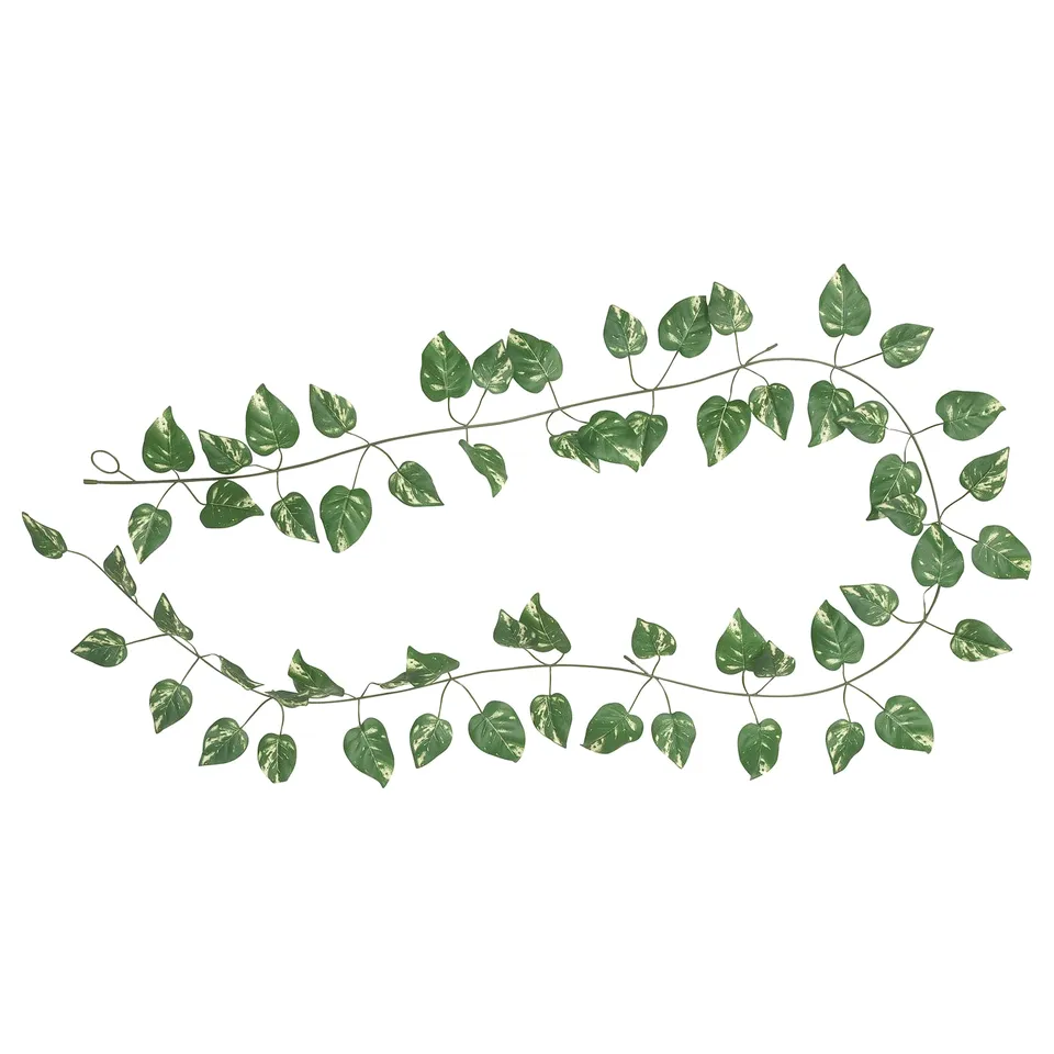 SMYCKA: green artificial plant, recycled materials, natural design, white background.