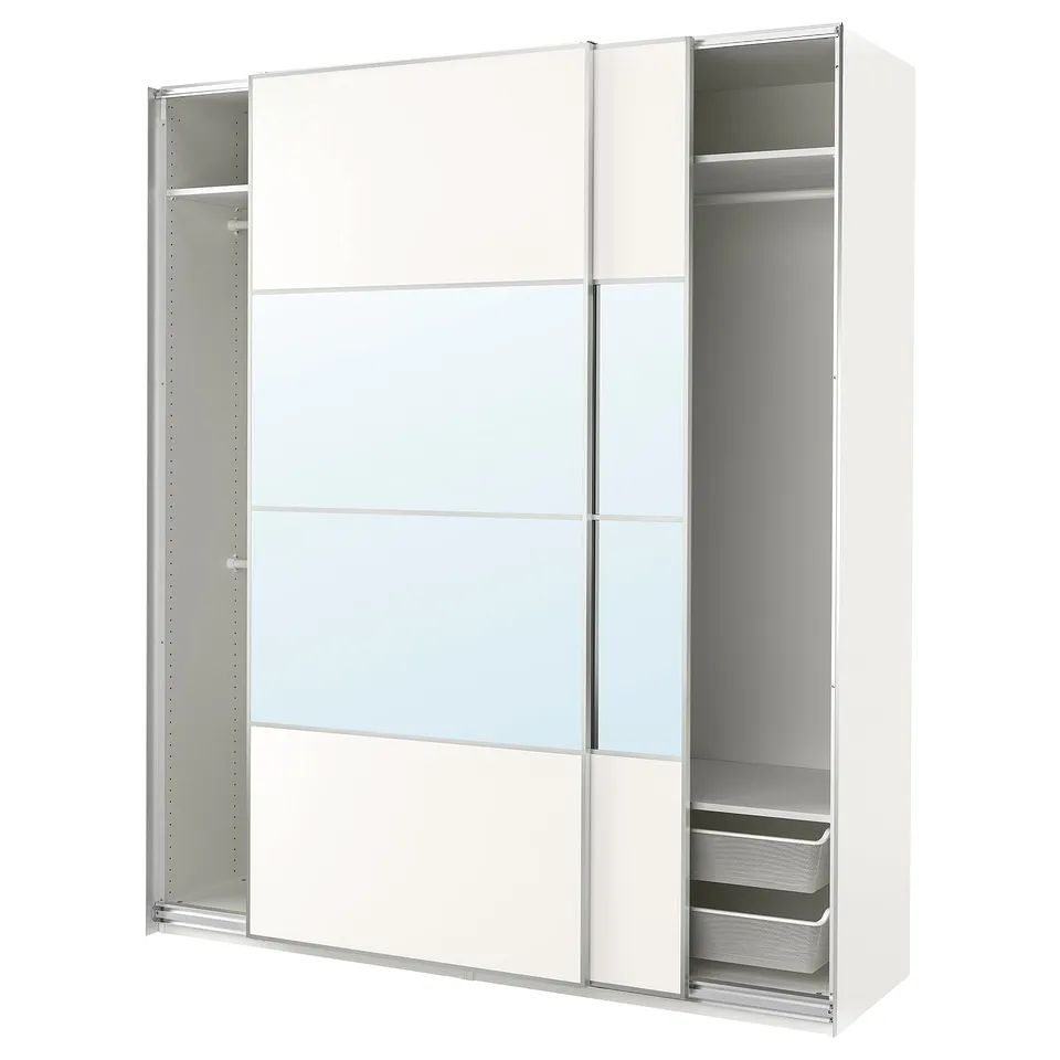 A white PAX wardrobe with mirrored sliding doors, featuring mesh baskets and storage shelves.