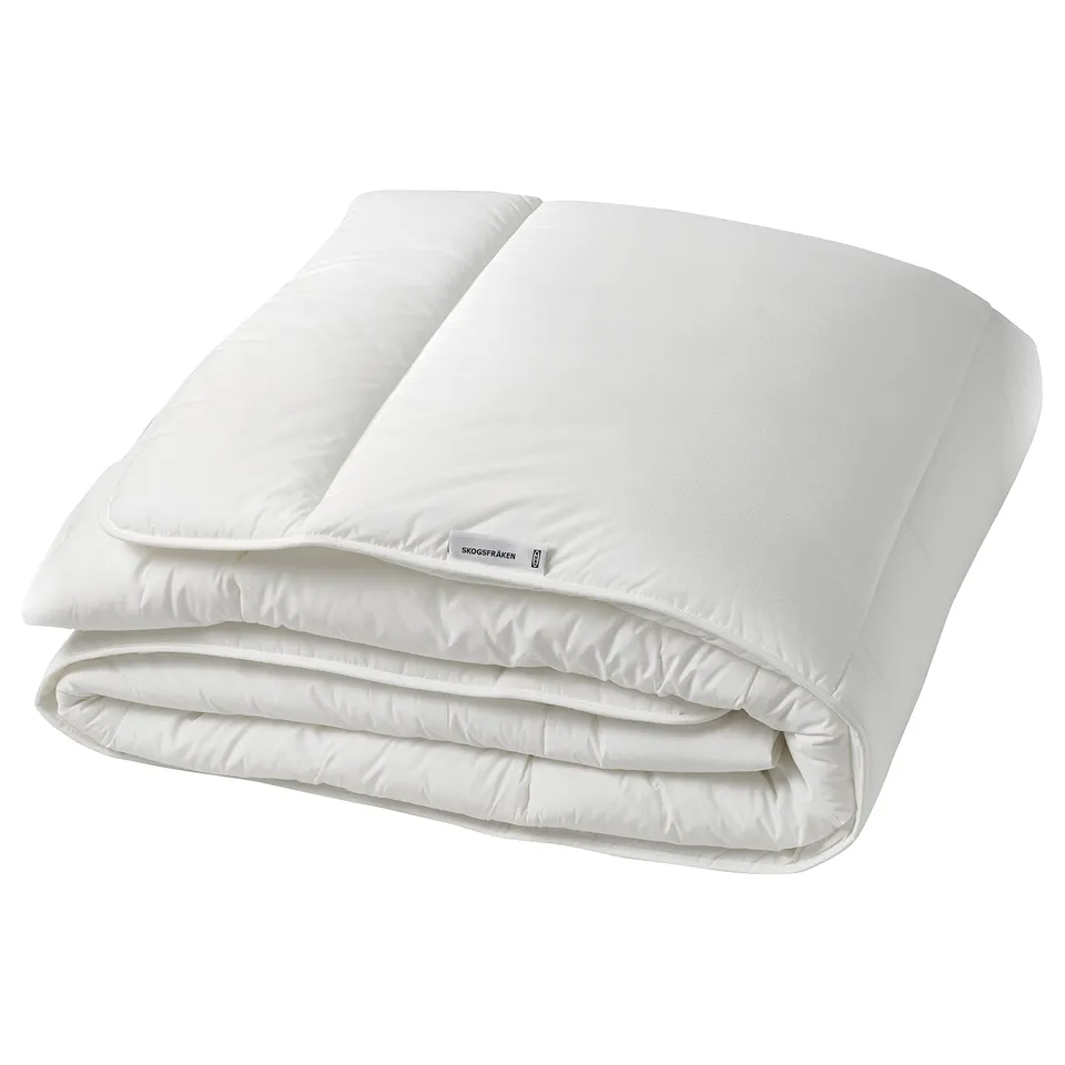Folded white SKOGSFRÄKEN duvet, eco-friendly, soft & fluffy fill, breathable fabric, for warm sleep.
