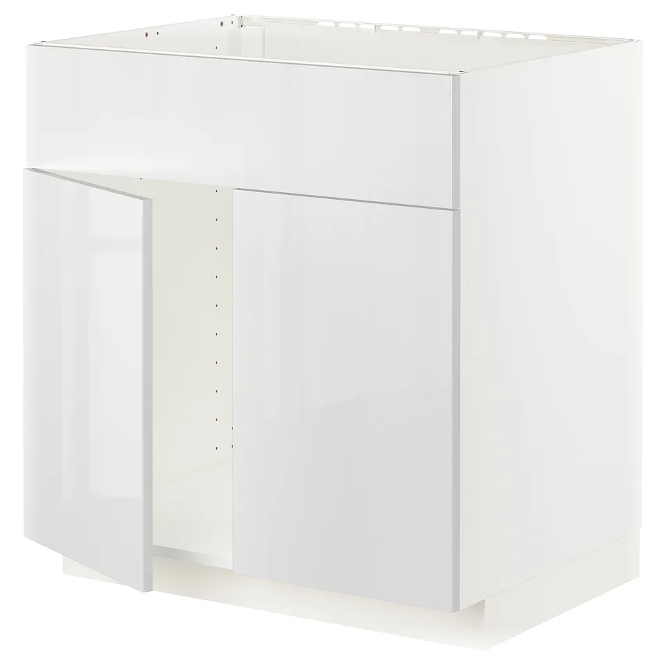 White kitchen cabinet unit, modern design, glossy finish, square shape, with no door.