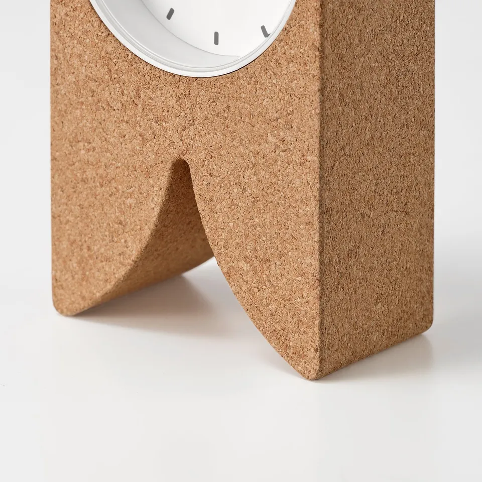 Cork clock with metal face, three hands, stylish and silent.