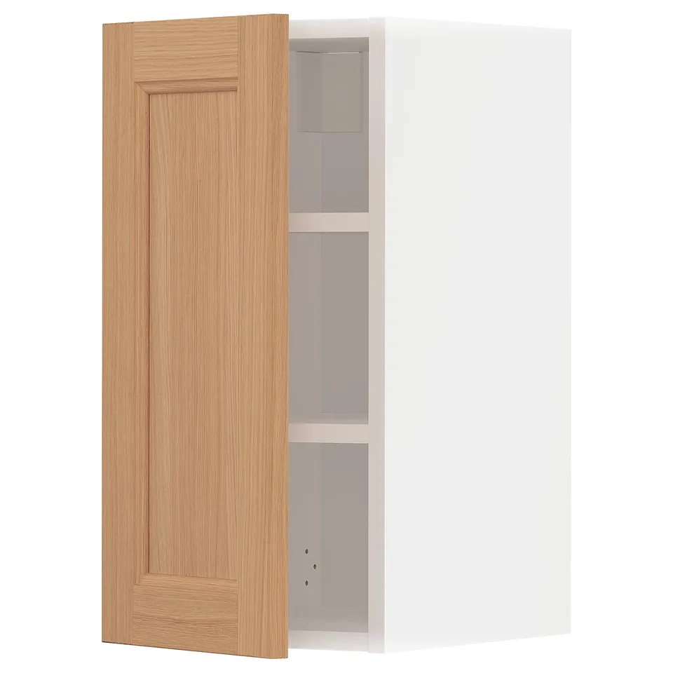 A light brown wooden cabinet door with a simple design, mounted on a white cabinet with two shelves.