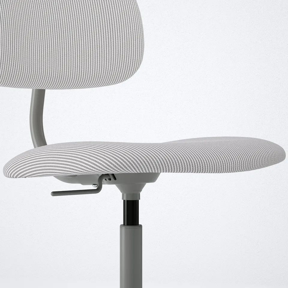 Modern office chair with adjustable seat and swivel function. Patterned fabric seat and back for comfort.