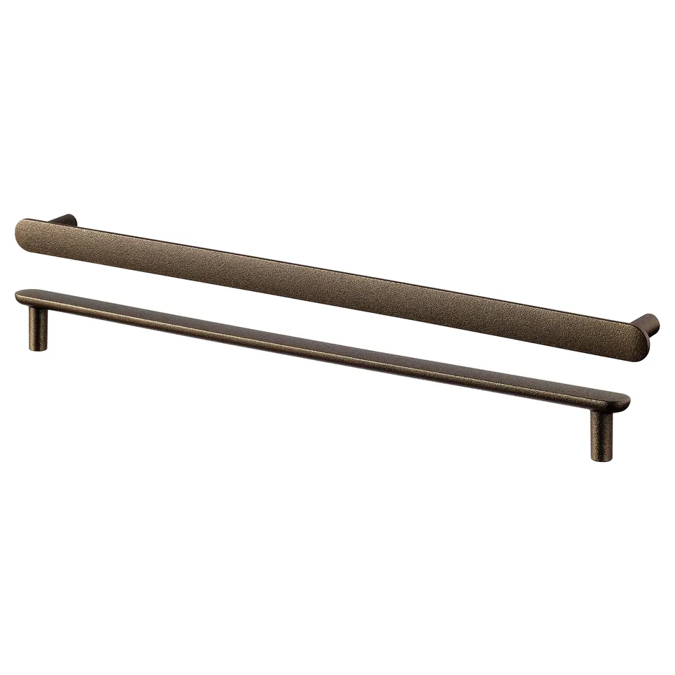 Two NYDALA aluminium handles in bronze. They have a sleek, horizontal design with rounded edges.