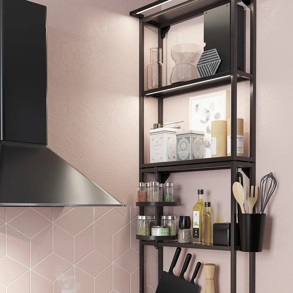 Modern kitchen with black appliances, wooden counter, and hexagonal pink tiles. Open shelves hold various cooking tools and spices.