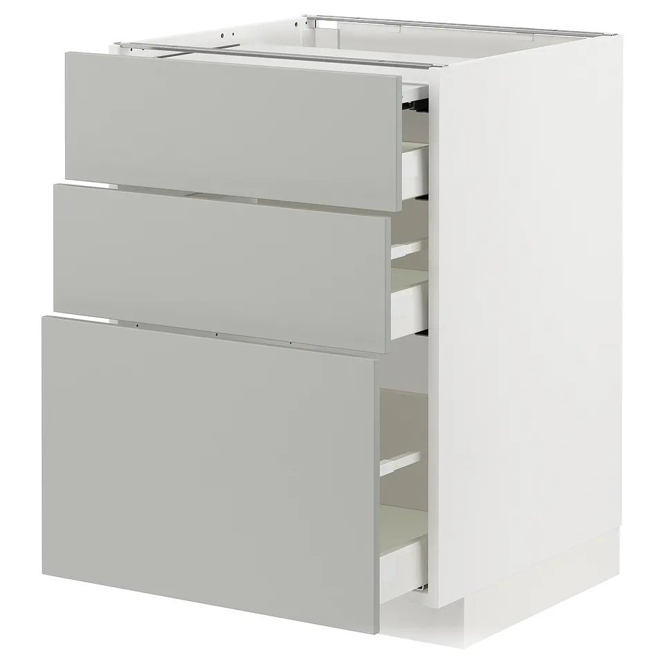 Modern white ikea METOD kitchen unit with three grey drawers and sleek handles.