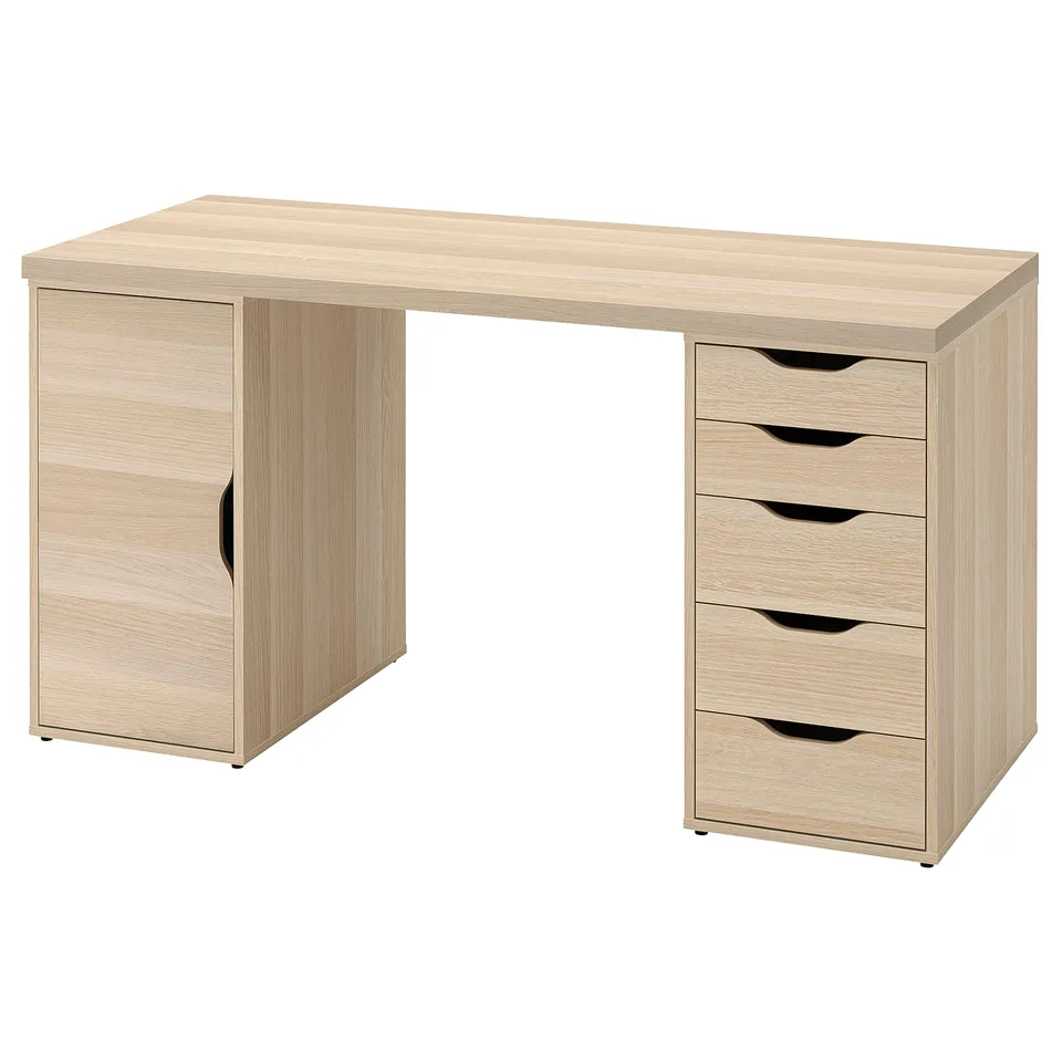 A light wooden desk named LAGKAPTEN with a cabinet and drawers for storage.