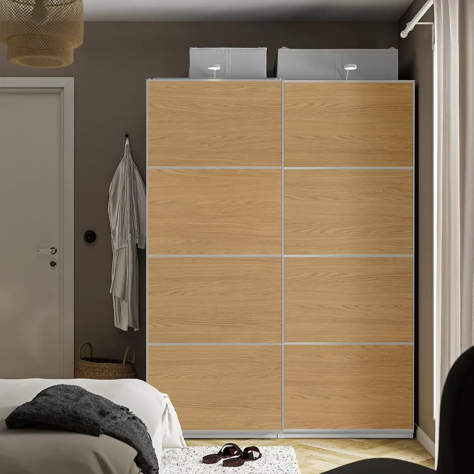 MEHAMN wardrobe: light oak, modern, sliding doors next to bed, spacious, clear storage.