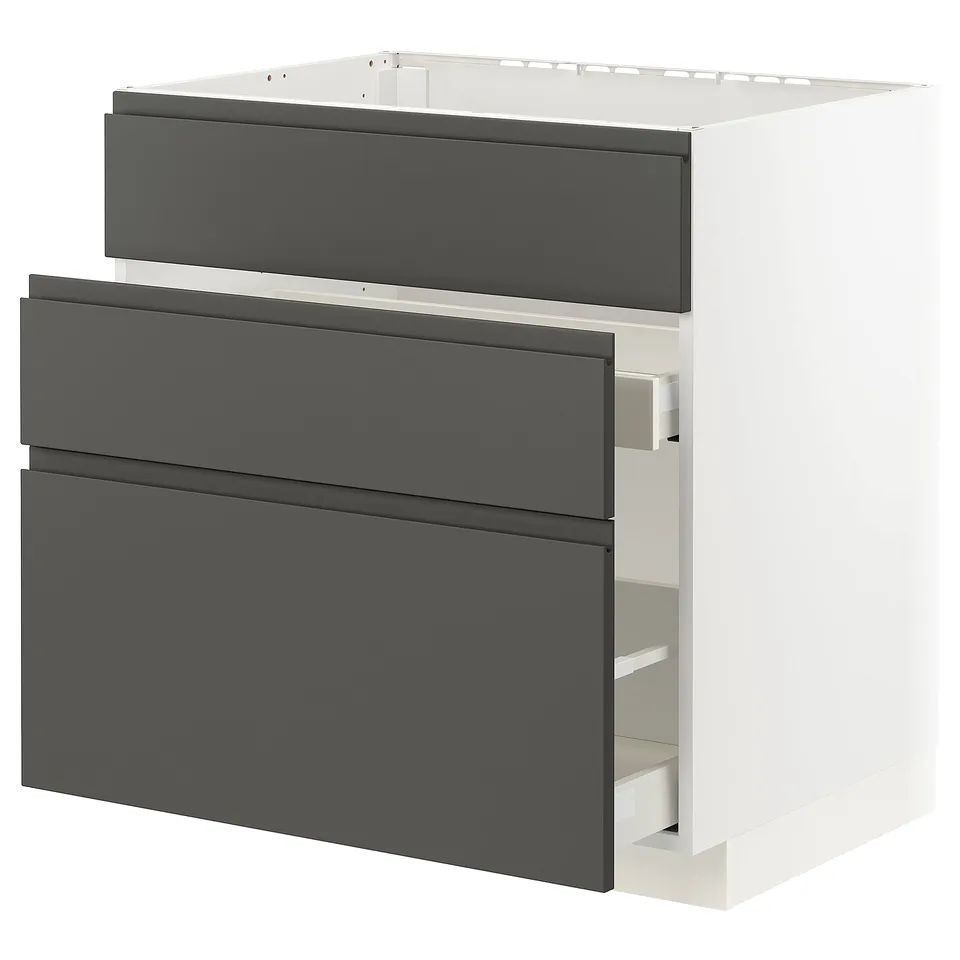 A modern, white METOD kitchen unit with three dark grey drawers and integrated handles.