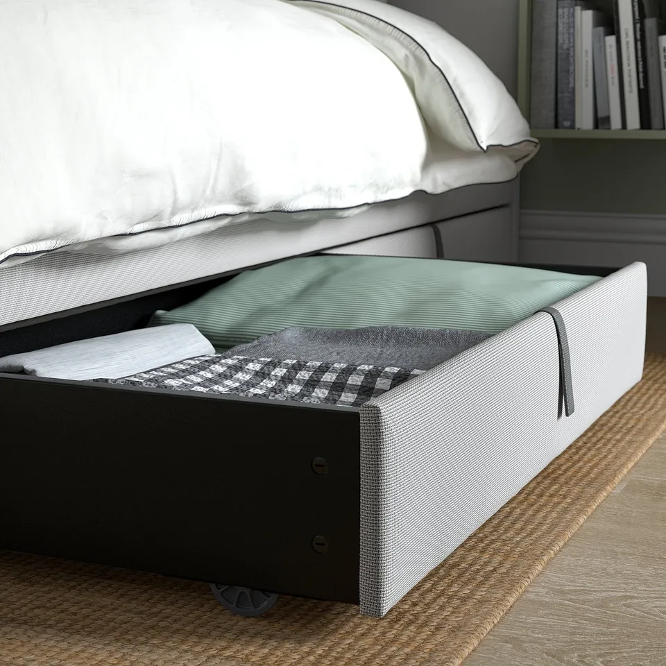 Under-bed storage boxes on wheels, easy to pull out and hide stains.