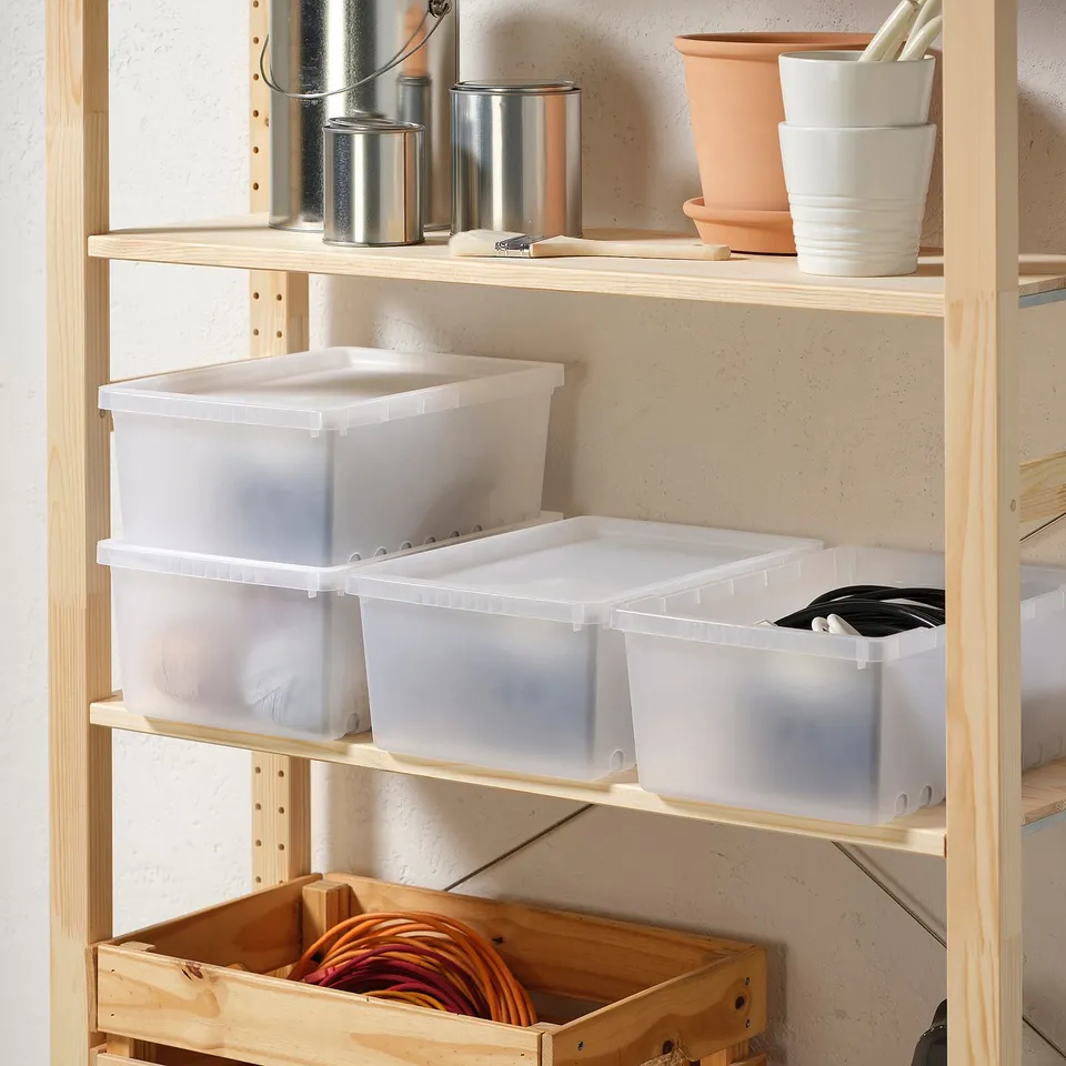 Wooden shelves with UPPSNOFSAD boxes, buckets, and stacked pots.