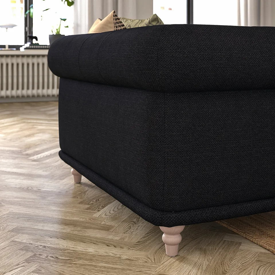 Black VISKAFORS sofa, dark fabric, round arms, wooden legs, cosy, modern design.