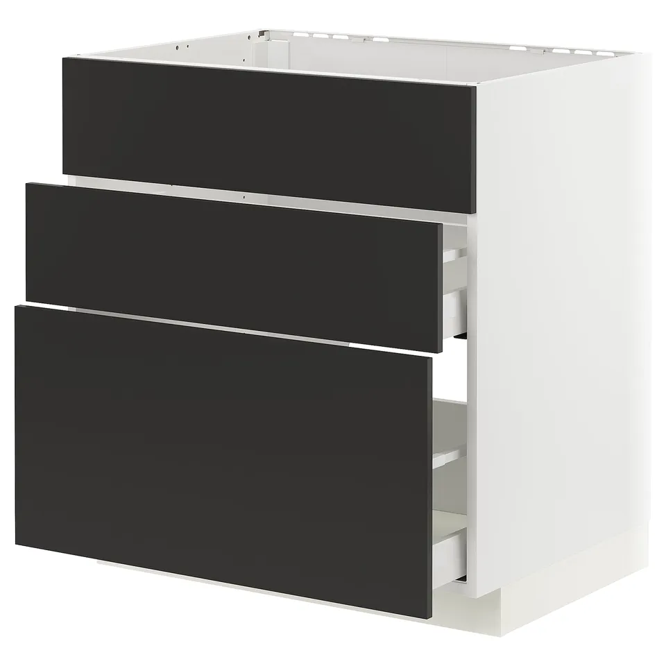 White and black modern kitchen cabinet with three drawers.
