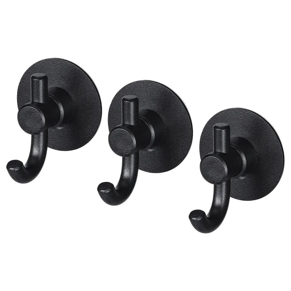 Three black VALASJÖN hooks; simple, functional design with round backs and curved hooks, ideal for organisation.